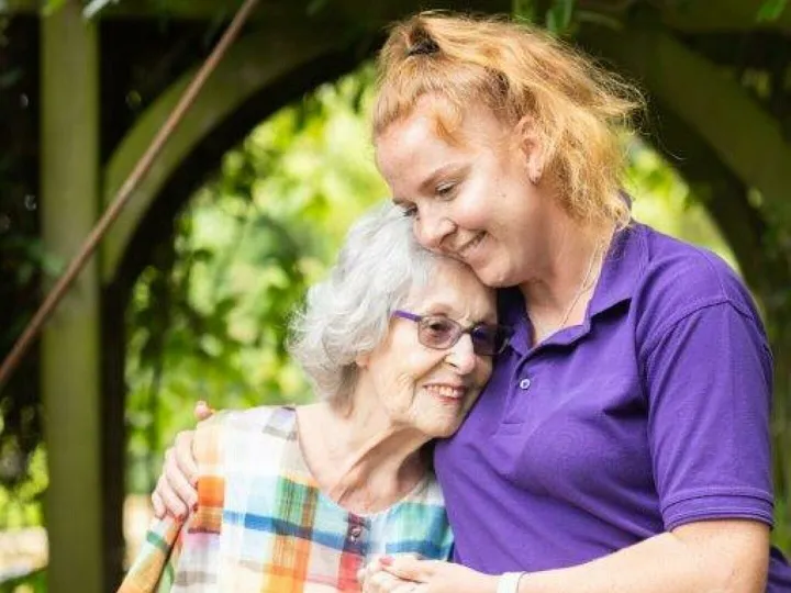 Ann in Her Garden With Carer Jody Roberts