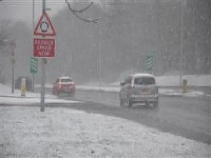 Cars driving in snow