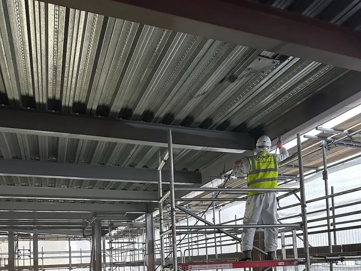 Warehouse construction with staircase and steel frame