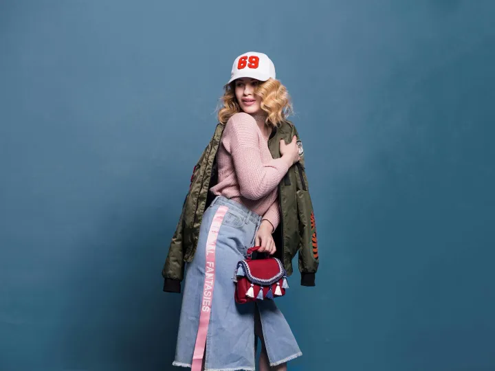 Fashion portrait of a young woman with a stylish d